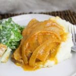 plated pork chops with mashed potatoes and salad