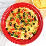 taco dip overhead shot in red plate