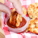 pizza muffin dipped in sauce