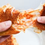 Sandwich pulled apart and cheesy