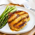 Pork chops on a white plate