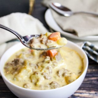 cheeseburger soup in a white bowl