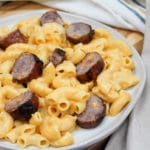 pasta and brats on a plate