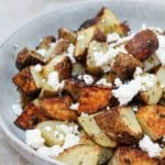 Roasted Potatoes with Lemon, Oregano and Feta in a bowl