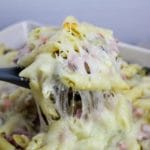muffaletta casserole scooped from baking dish
