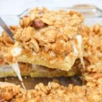 salted nut roll bar scooped from pan