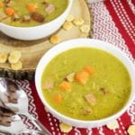 split pea and kielbasa soup in a white bowl