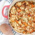 Stuffing with sweet potaotes and mushrooms in a red dutch oven