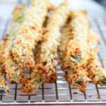 asparagus fries on a baking sheet