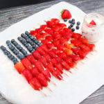 fruit kabobs on a tray