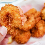 Cajun shrimp dipped in sauce