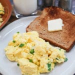 egg on a plate and in the skillet