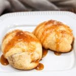 caramel apple pie bomb on a plate with caremel