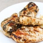 grilled lemon pepper chicken on white plate