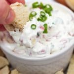 bagel dip scooped from cup