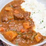 pumpkin beef stew in a gray bowl
