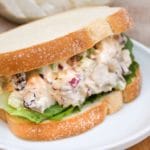 Cranberry Pecan Chicken on white bread on a plate