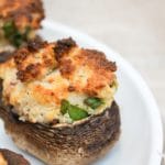 air fryer stuffed mushroom on a white plate
