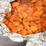 grilled sweet potatoes in a foil packet.