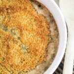 creamy mushrooms baked with a breadcrumb topping topped with fresh thyme.
